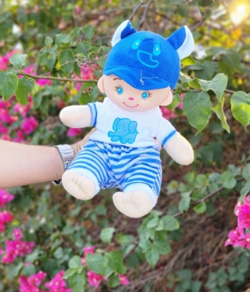 تصویر  عروسک نوزاد لباس راه راه